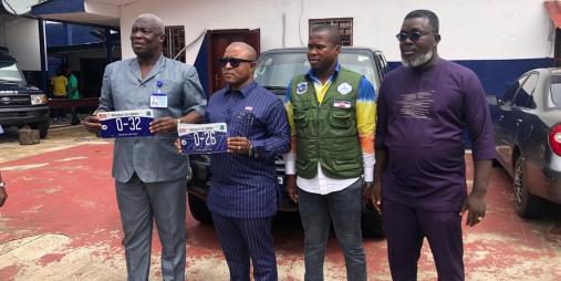 GSA Boss Hon. Galakpai Kortimai and Ministry of Transport Boss Sirleaf Ralph Tyler, with Directors of Plates (GSA) and Director of Inspectorate Africanuous Fahnbullah of MOT.